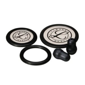 A set of Littmann stethoscope replacement parts, including two circular diaphragms with the Littmann logo, a black O-ring, and two black eartips, all on a white background.